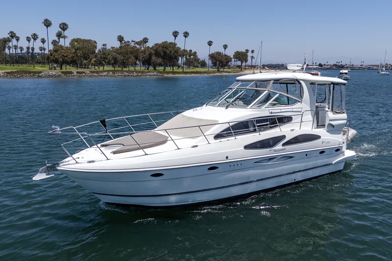 Slide: The Image of 2008 Cruisers Yachts 415 Express Motoryacht cruising on a sunny day. - 0