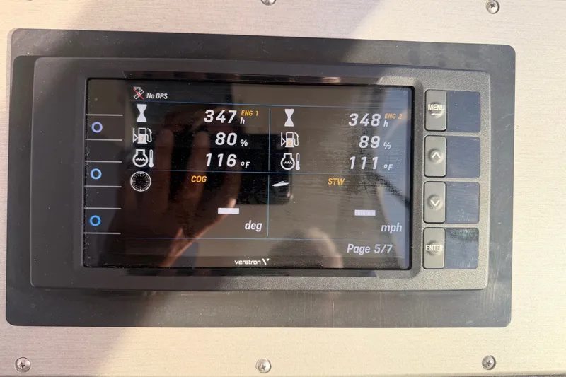 Slide: The Image of Display screen of 2008 Cruisers Yachts 415 Express Motoryacht showing engine data and settings. - 68