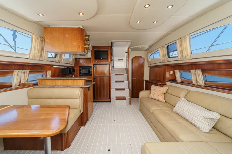 Slide: The Image of Luxurious interior of 2008 Cruisers Yachts 415 Express Motoryacht with elegant wood finishes. - 36