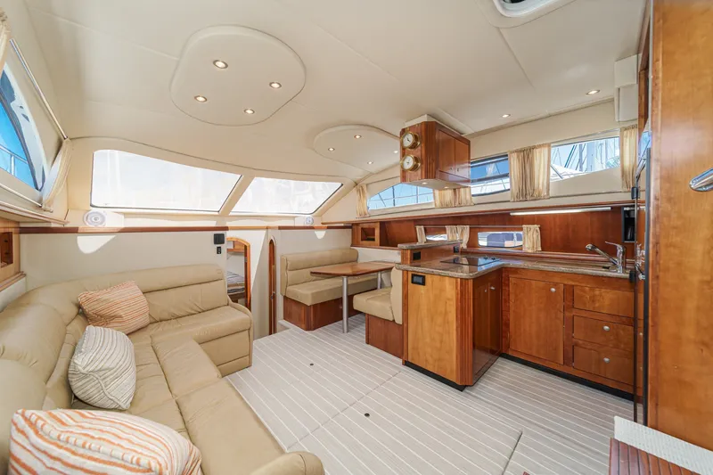Slide: The Image of Luxurious interior of 2008 Cruisers Yachts 415 Express Motoryacht with elegant wood finishes. - 35