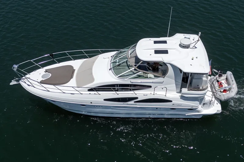 Slide: The Image of 2008 Cruisers Yachts 415 Express Motoryacht cruising on open water, aerial view. - 9