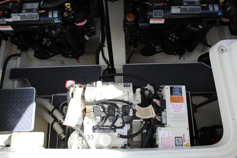 Slide: The Image of Engine compartment of 2023 Formula 330 Crossover Bowrider, showcasing mechanical components. - 43