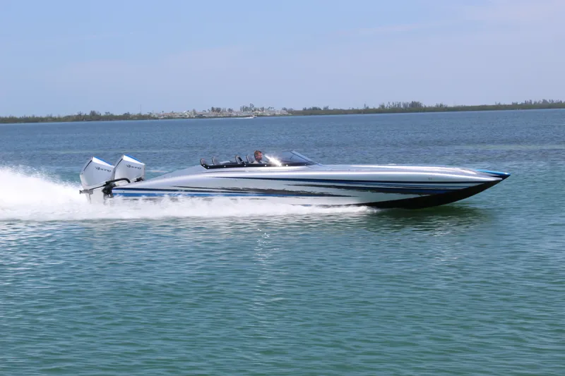 Slide: The Image of 2025 Fountain 34 Thundercat speedboat cruising on open water. - 36