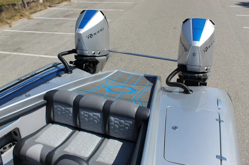 Slide: The Image of 2025 Fountain 34 Thundercat boat with twin outboard engines and stylish seating. - 21