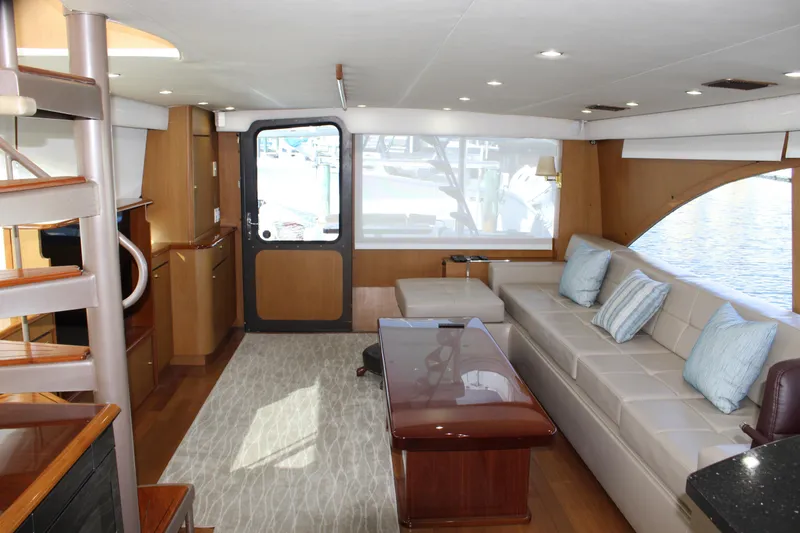 Slide: The Image of Interieur van Ocean Yachts 65 Odyssey 2003 met bank en tafel. - 30