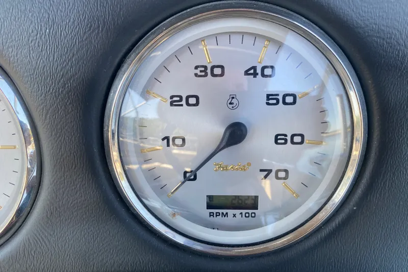 Slide: The Image of Gauge display on 2012 Harris FloteBote Grand Mariner SL 250, showing RPM and temperature. - 19