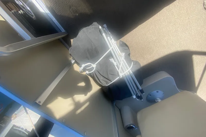 Slide: The Image of Folded black canopy on Harris FloteBote Grand Mariner SL 250, 2012 model. - 15