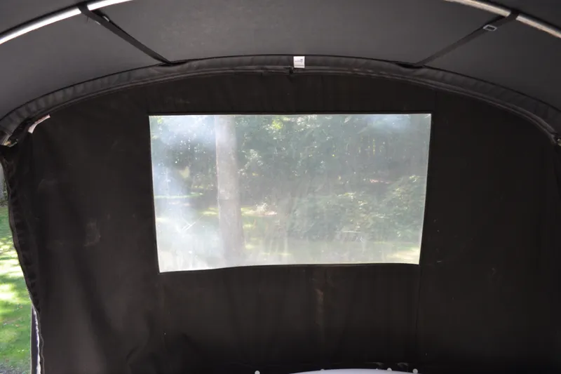 Slide: The Image of Interior view of 2007 Sea Ray Sundancer 280 boat canopy with window. - 20