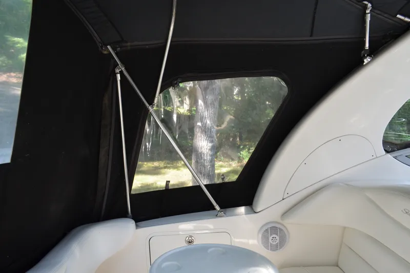 Slide: The Image of Interior view of 2007 Sea Ray Sundancer 280 boat with black canopy and seating. - 21