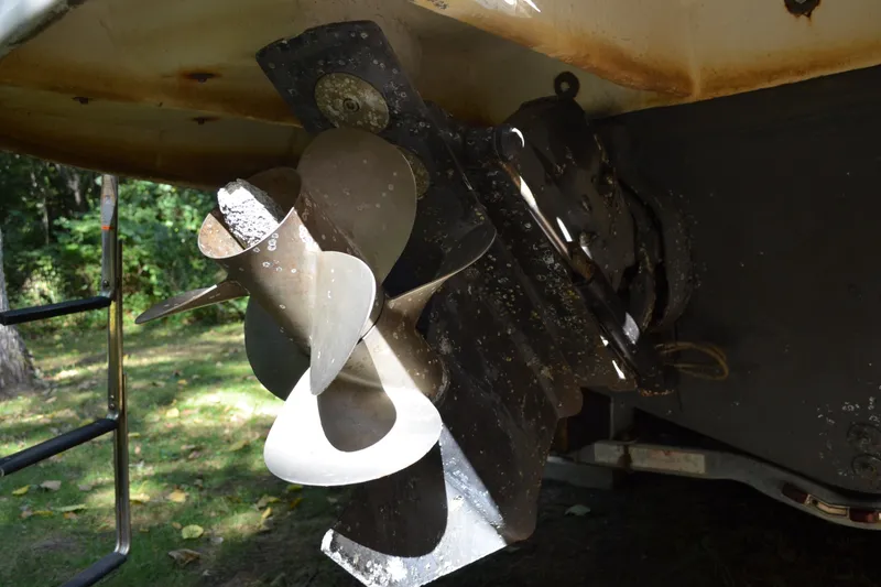 Slide: The Image of Propeller of a 2007 Sea Ray Sundancer 280 boat, showing wear and marine growth. - 6