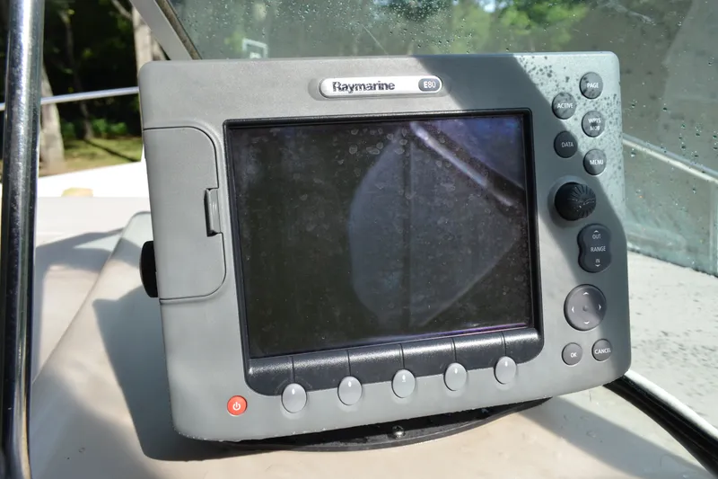 Slide: The Image of Raymarine E80 navigation system on 2007 Sea Ray Sundancer 280 boat dashboard. - 30