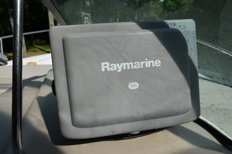 Slide: The Image of Raymarine E80 navigation system on 2007 Sea Ray Sundancer 280 boat dashboard. - 29