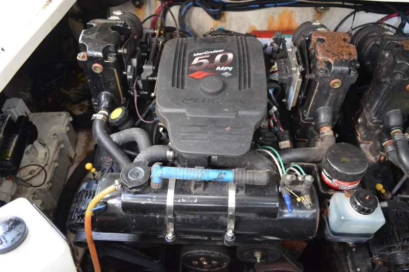Slide: The Image of Engine compartment of a 2007 Sea Ray Sundancer 280 with Mercury 5.0 MPI engine. - 56