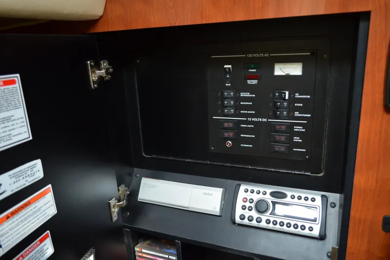 Slide: The Image of Electrical control panel inside 2007 Sea Ray Sundancer 280 boat cabin. - 50