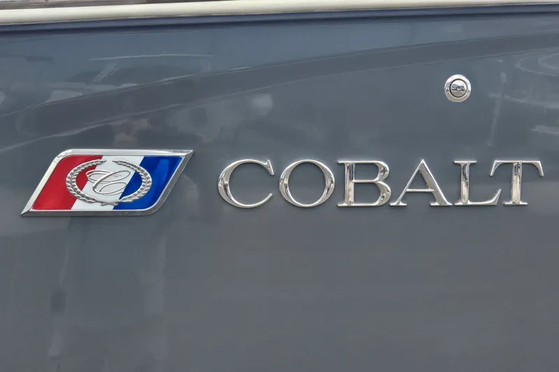 Slide: The Image of 2023 Cobalt 30SC Outboard logo on a sleek gray surface. - 19