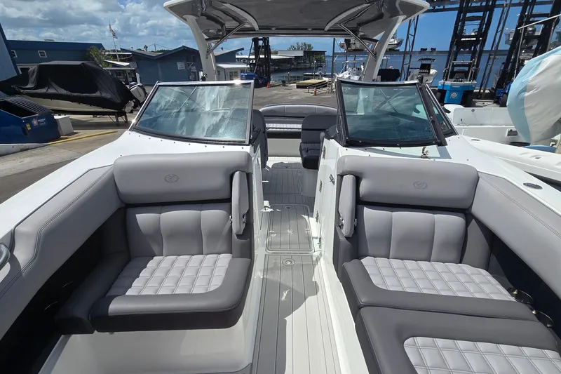 Slide: The Image of 2023 Cobalt 30SC Outboard boat interior with luxurious seating and modern design. - 16