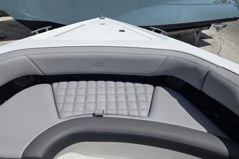 Slide: The Image of 2023 Cobalt 30SC Outboard boat interior with luxurious seating and modern design. - 14