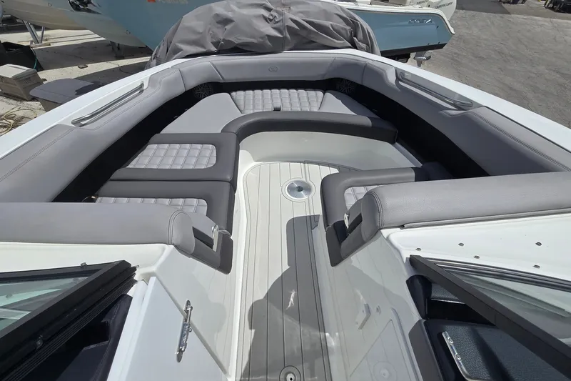 Slide: The Image of 2023 Cobalt 30SC Outboard boat interior with luxurious seating and modern design. - 15