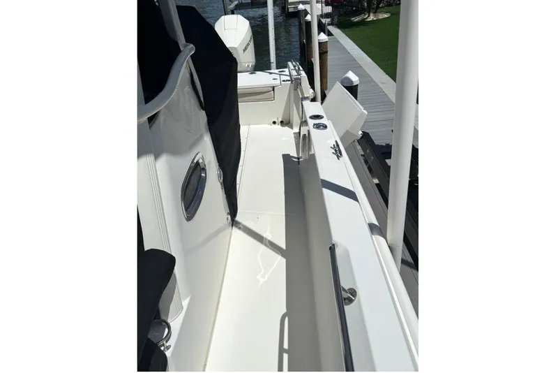 Slide: The Image of 2022 Boston Whaler 270 Dauntless boat deck, featuring sleek design and modern amenities. - 22
