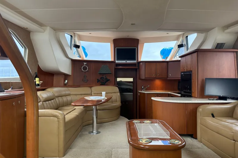 Slide: The Image of Luxurious interior of a 2005 Silverton 43 Motor Yacht with elegant furnishings and modern amenities. - 20