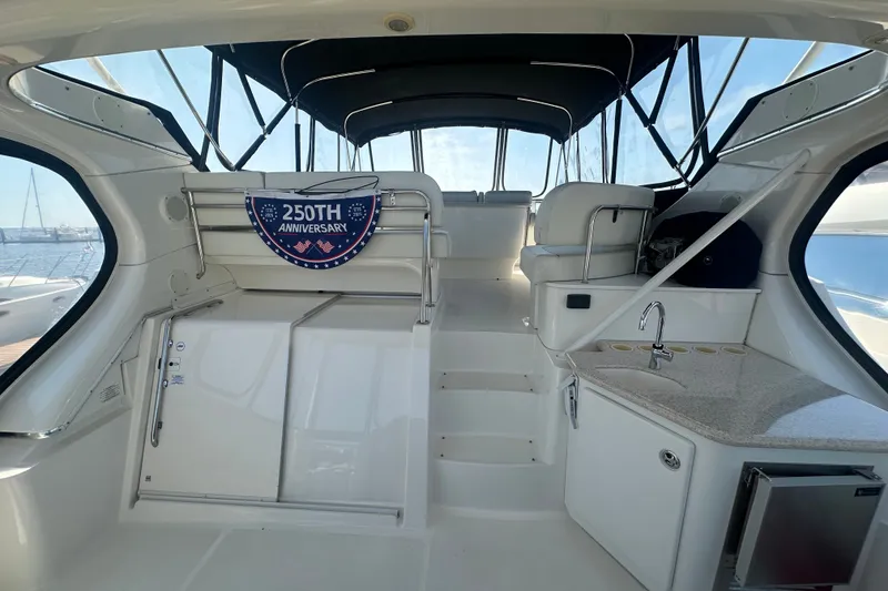 Slide: The Image of Interior of a 2005 Silverton 43 Motor Yacht with 250th anniversary banner. - 18