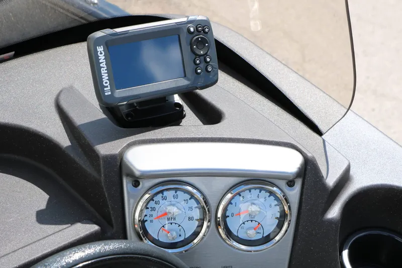 Slide: The Image of The dashboard of a 2023 Tracker Pro Guide V16 with a Lowrance fish finder. - 20
