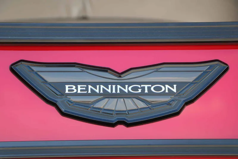 Slide: The Image of Close-up of the Bennington logo on a red background. - 12