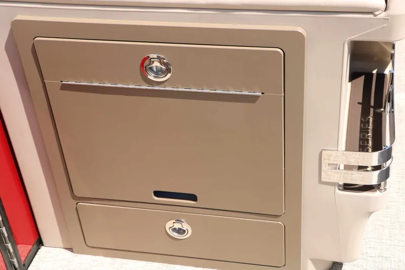 Slide: The Image of Close-up of a storage compartment on a Bennington 22 MFB Tri Toon boat. - 40