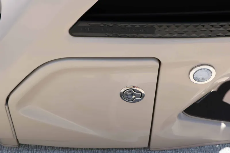 Slide: The Image of Close-up of a section of a Bennington 22 MFB Tri Toon boat with a lock. - 49