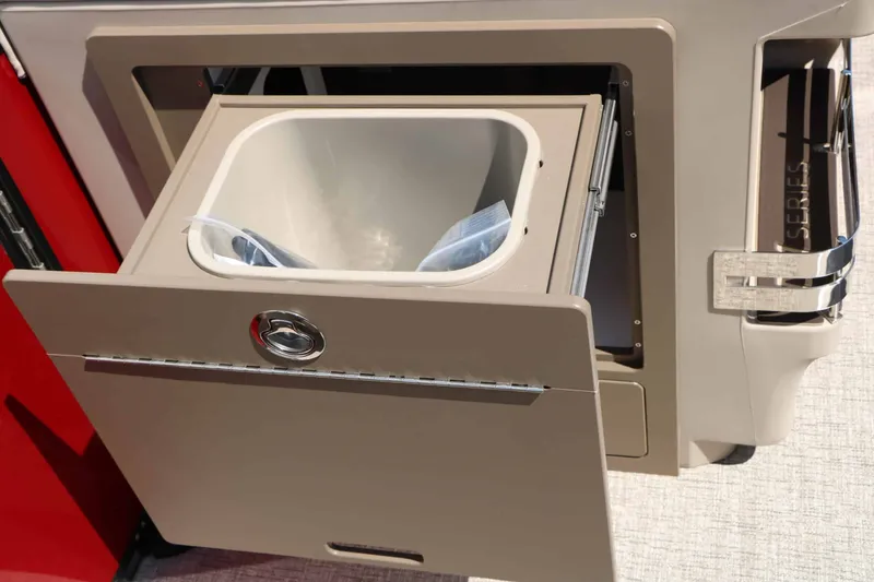 Slide: The Image of A pull-out trash bin in a modern boat kitchen area. - 41