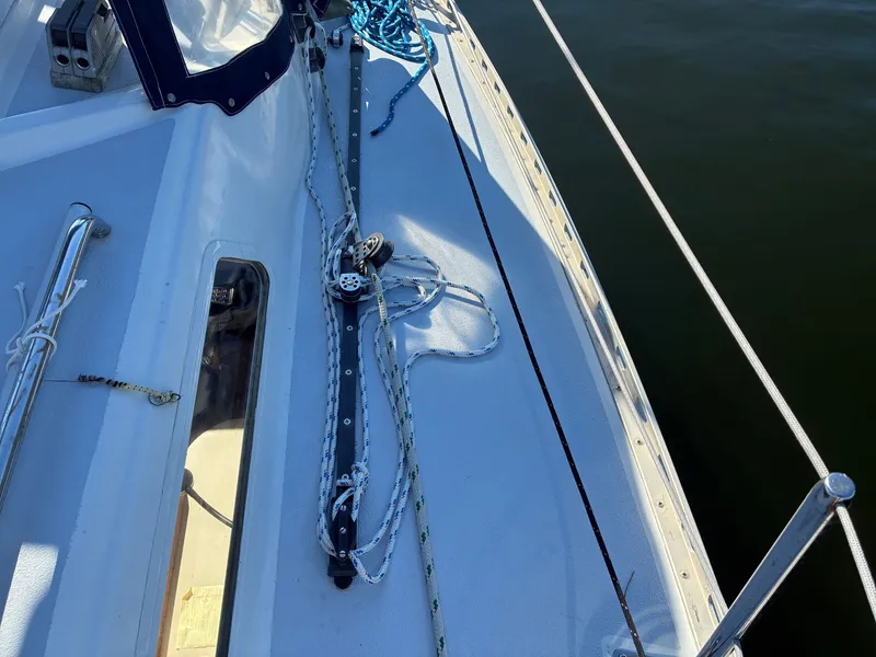 Slide: The Image of The deck of a 1973 Pearson 36 with ropes and fittings. - 16
