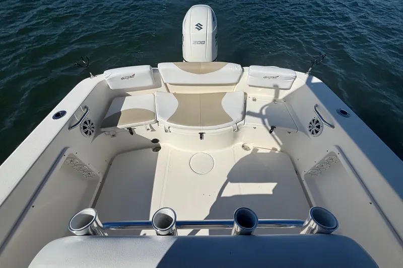 Slide: The Image of 2019 Bulls Bay 230 Center Console boat interior with seating and rod holders. - 14