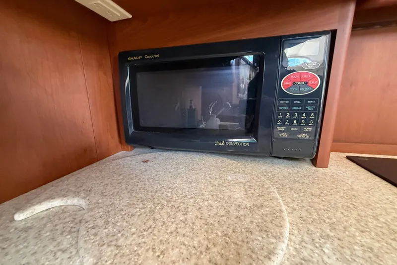Slide: The Image of Sharp Carousel microwave in 2004 Silverton 43 Motor Yacht kitchen. - 107