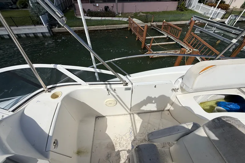 Slide: The Image of 2004 Silverton 43 Motor Yacht deck with seating and water view. - 41