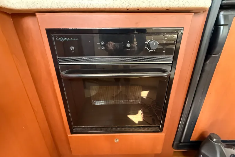 Slide: The Image of Built-in oven in 2004 Silverton 43 Motor Yacht kitchen area. - 101