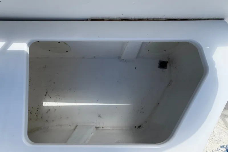 Slide: The Image of Storage compartment on a 2004 Silverton 43 Motor Yacht, showing interior details. - 20