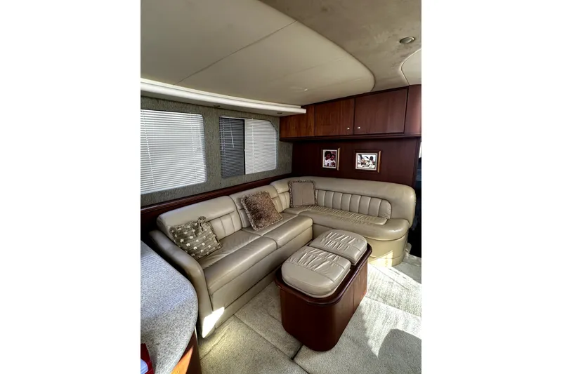Slide: The Image of Luxurious interior of 2004 Silverton 43 Motor Yacht with plush seating and elegant decor. - 3