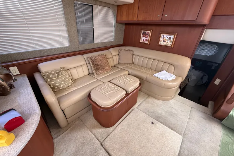 Slide: The Image of Luxurious interior of 2004 Silverton 43 Motor Yacht with beige leather seating. - 135