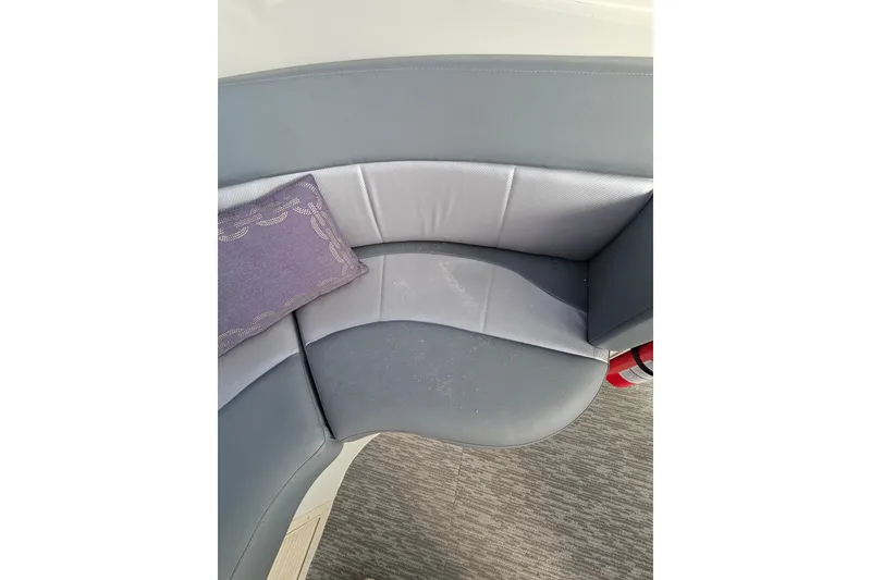 Slide: The Image of Gray seating area on 2001 Carver 564 Cockpit Motor Yacht with decorative pillow. - 44