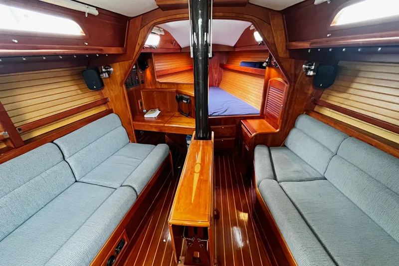 Slide: The Image of Luxurious 2007 Sabre Spirit yacht interior with wooden finish and cozy seating. - 28