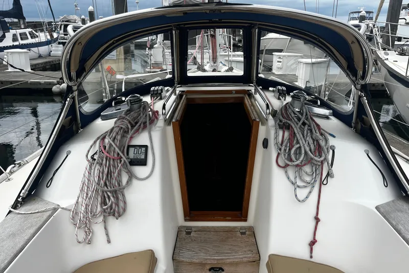 Slide: The Image of 2007 Sabre Spirit sailboat cockpit with ropes and navigation equipment at marina. - 15