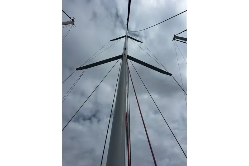Slide: The Image of Tall mast of 2007 Sabre Spirit sailboat against cloudy sky. - 22