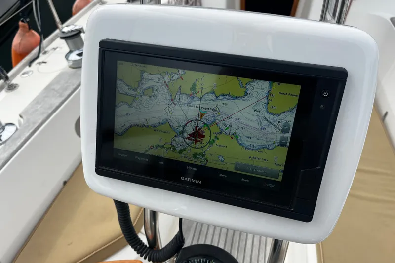 Slide: The Image of Garmin navigation system on 2007 Sabre Spirit sailboat, displaying nautical chart. - 24