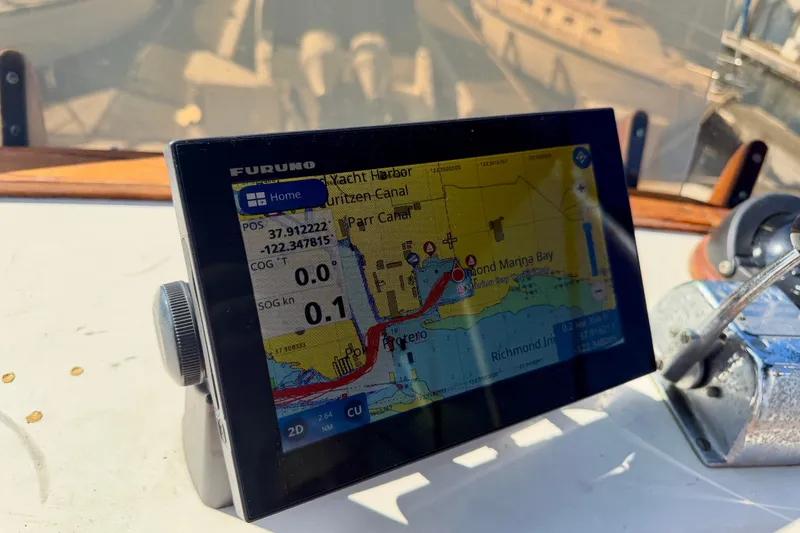 Slide: The Image of Navigation system on a 1975 Grand Banks 32 Sedan displaying a nautical map. - 10