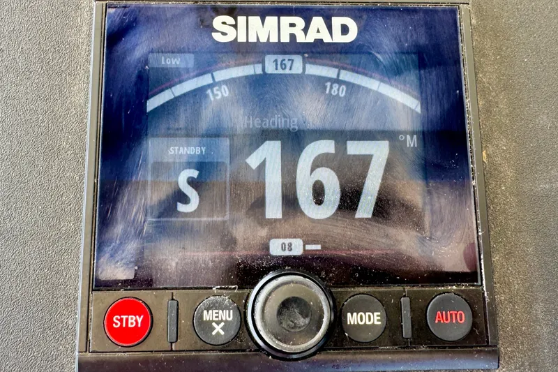 Slide: The Image of Simrad marine display showing heading 167° on a 1981 Bertram 46.6 yacht. - 28
