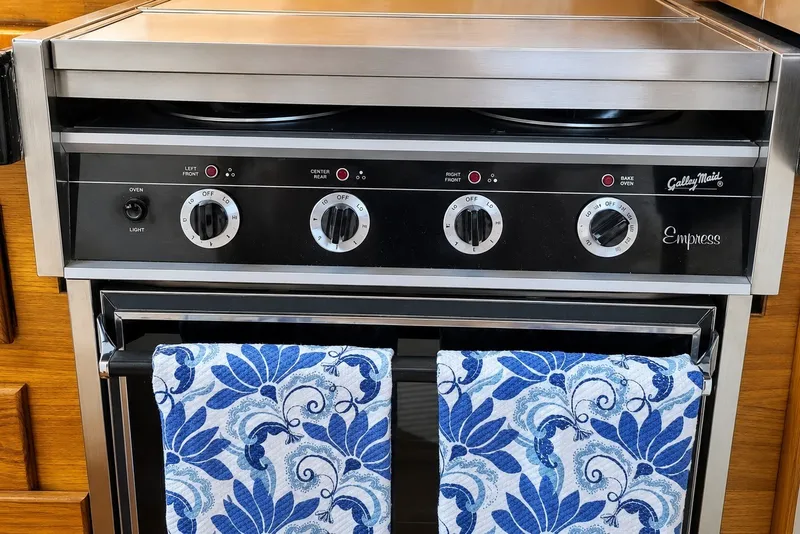 Slide: The Image of Stainless steel oven with blue floral towel, Bertram 46.6 yacht, 1981 model. - 11