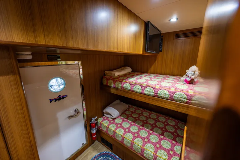 Slide: The Image of Cozy cabin with bunk beds in 2011 Ocean Alexander 60 Trawler yacht. - 106