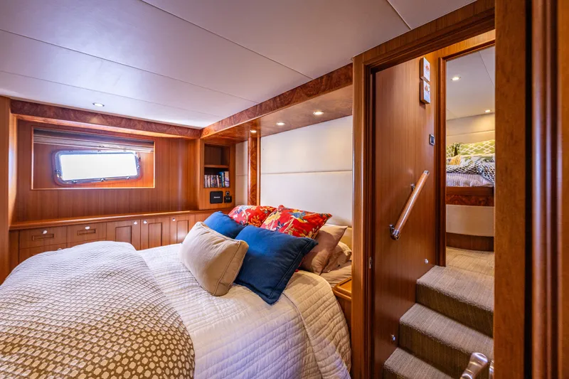 Slide: The Image of Luxurious bedroom interior of 2011 Ocean Alexander 60 Trawler yacht with cozy bedding. - 83