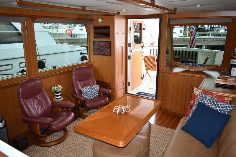 Slide: The Image of Luxurious interior of 2011 Ocean Alexander 60 Trawler with elegant seating and wooden finishes. - 71