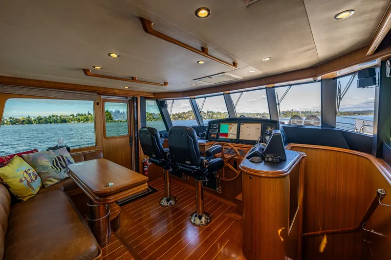Slide: The Image of Luxurious interior of 2011 Ocean Alexander 60 Trawler with panoramic windows and elegant wood finishes. - 68